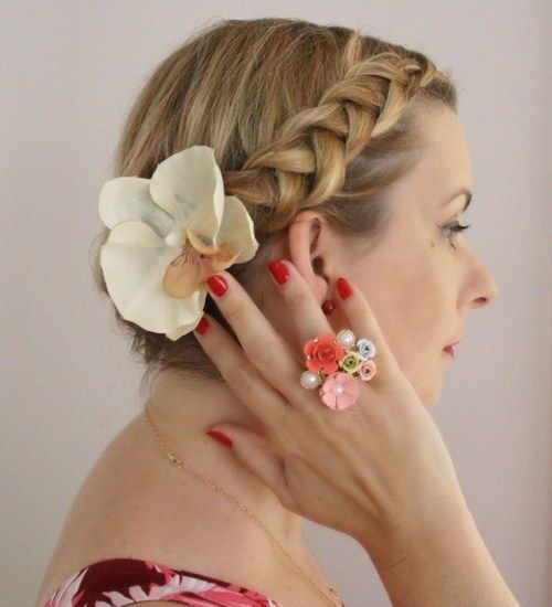 сплетена vintage updo with a hair flower