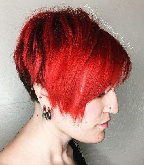 ярък red asymmetrical pixie with side bangs