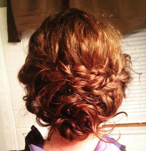 разхвърлян loose updo with two braids