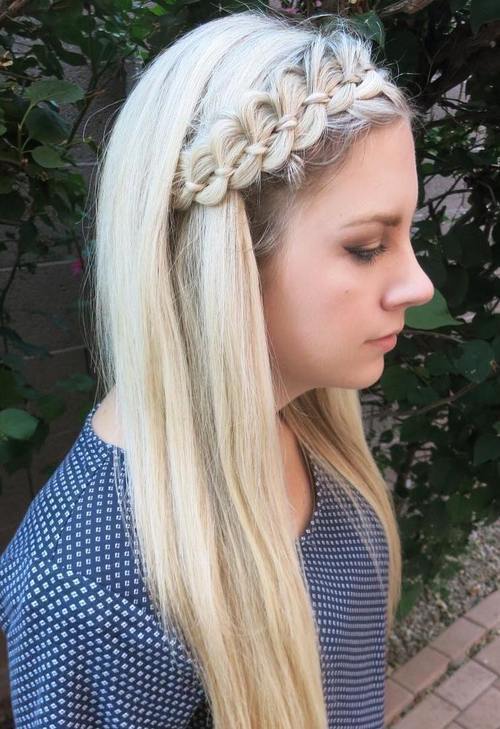 дълго blonde hairstyle with a four-strand braided headband