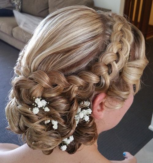 kudrnatý wedding updo with a dutch braid for long hair