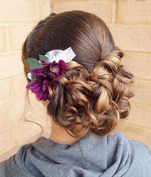 ниско curly updo with flowers