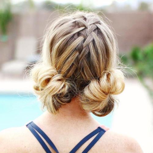 две Low Buns With A Centre Braid