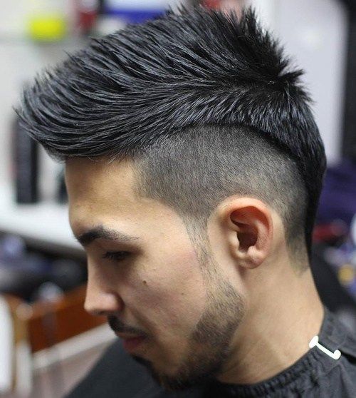 男人's spiky haircut with undercut