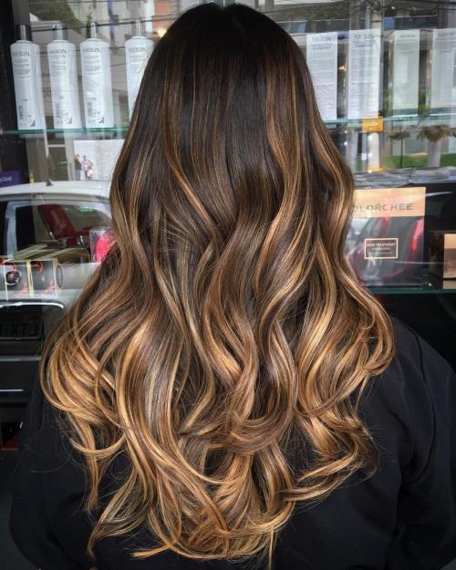 тъмен brown hair with golden brown ombre highlights