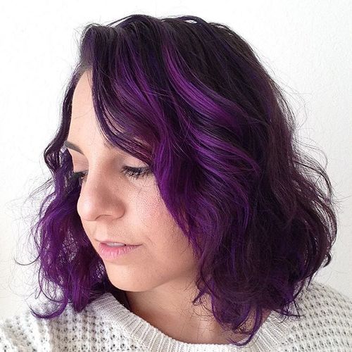 тъмен brown hair with bright purple highlights