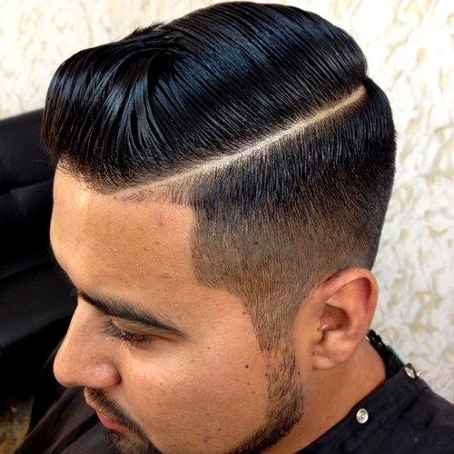 Männer's side part hairstyle with fade on the sides