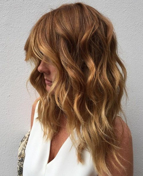 карамел layered hair with golden blonde highlights
