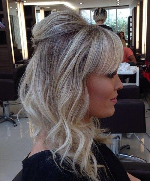 popel blonde hairstyle with bangs