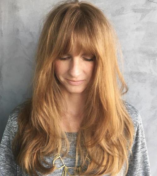 дълго Strawberry Blonde Hairstyle With Bangs