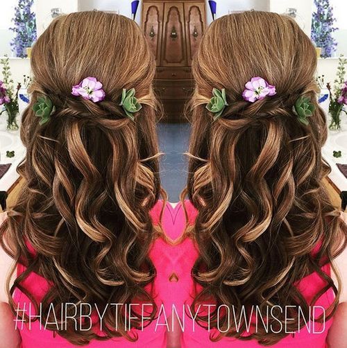 polovina up curly hairstyle with flowers 