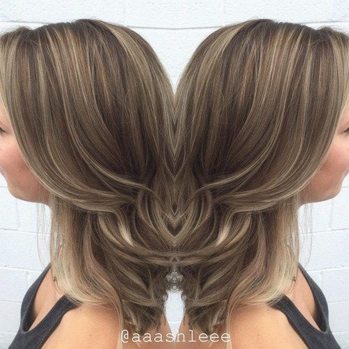 popel brown hair with thin highlights