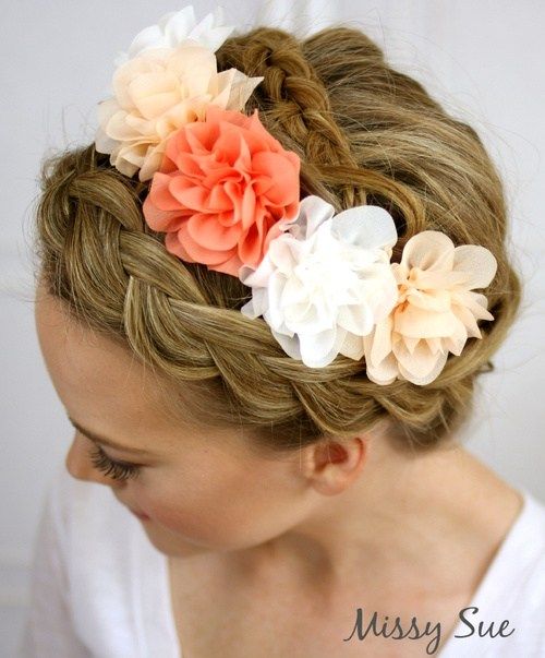 koruna braid hairstyle with hair flowers