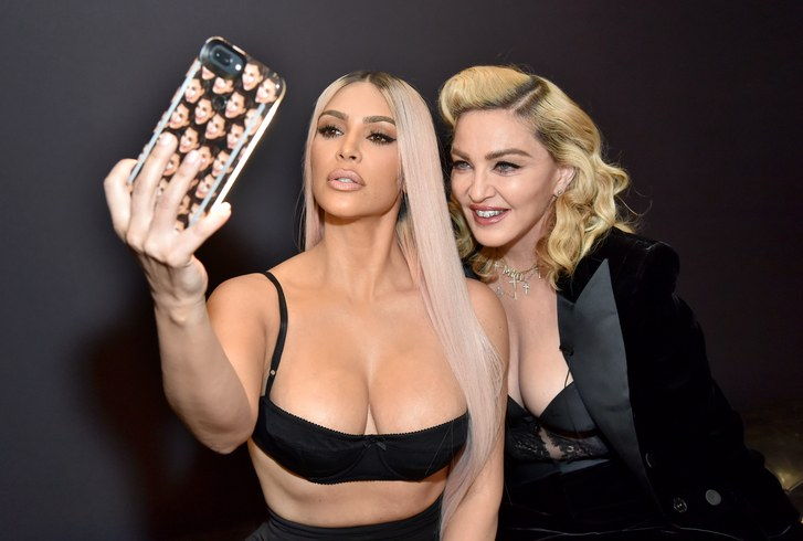 Kim Kardashian West and Madonna take a selfie at the MDNA Skin event in Los Angeles 
