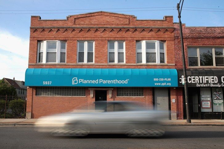 CHICAGO, IL - MAY 18: A motorist passes a Planned Parenthood clinic on May 18, 2023 in Chicago, Illinois. The Trump administration is expected to announce a plan for massive funding cuts to Planned Parenthood and other taxpayer-backed abortion providers by reinstating a Reagan-era rule that prohibits federal funding from going to clinics that discuss abortion with women or that share space with abortion providers.