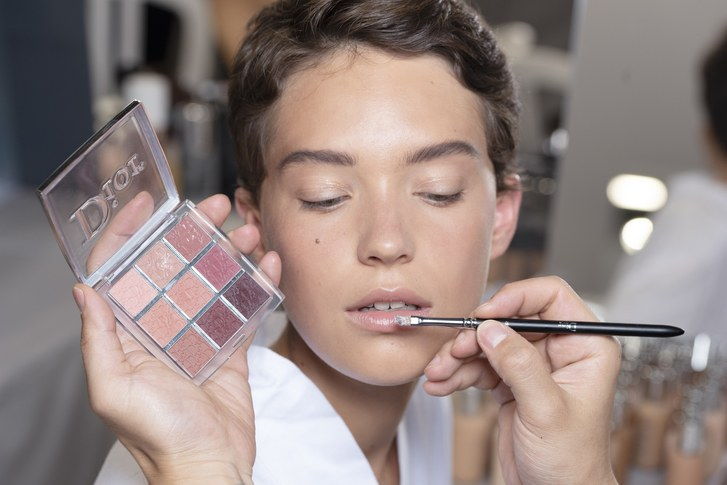 The new Dior Backstage lipstick palette being used on a model backstage at the Dior Cruise show in Chantilly, France. 