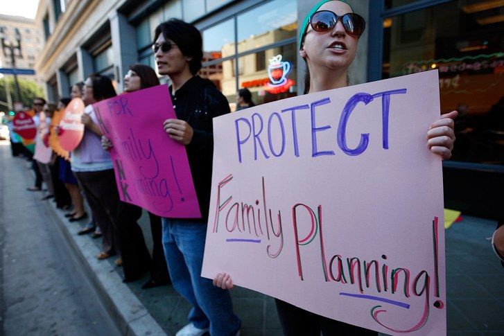Demonstranti Protest Against Gov.'s Plans To Cut Family Planning Funding