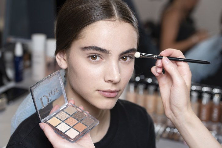 The new Dior Backstage eye shadow palette being used on a model backstage at the Dior Cruise show in Chantilly, France. 